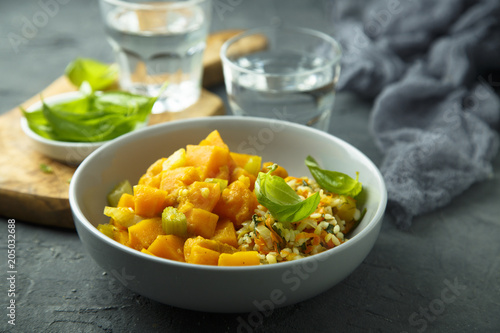 Pumpkin stew with rice and fresh basil