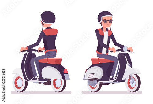 Young man riding a scooter