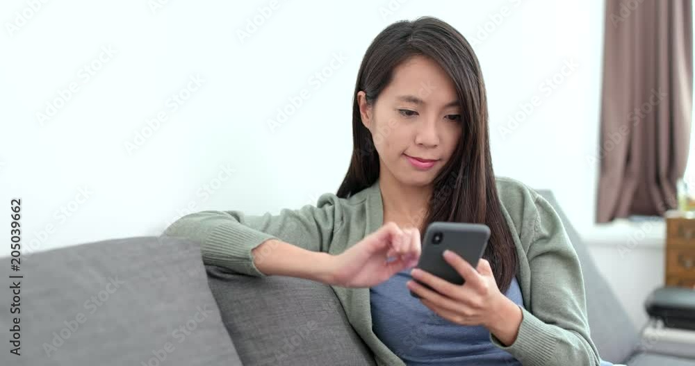 Housewife use of mobile phone at home Housewife use of mobile phone at home