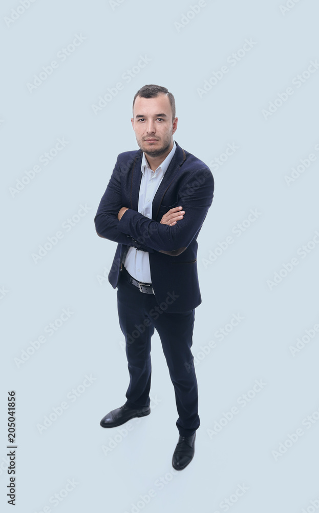 in full growth. confident businessman looking at the camera in full growth. confident businessman looking at the camera