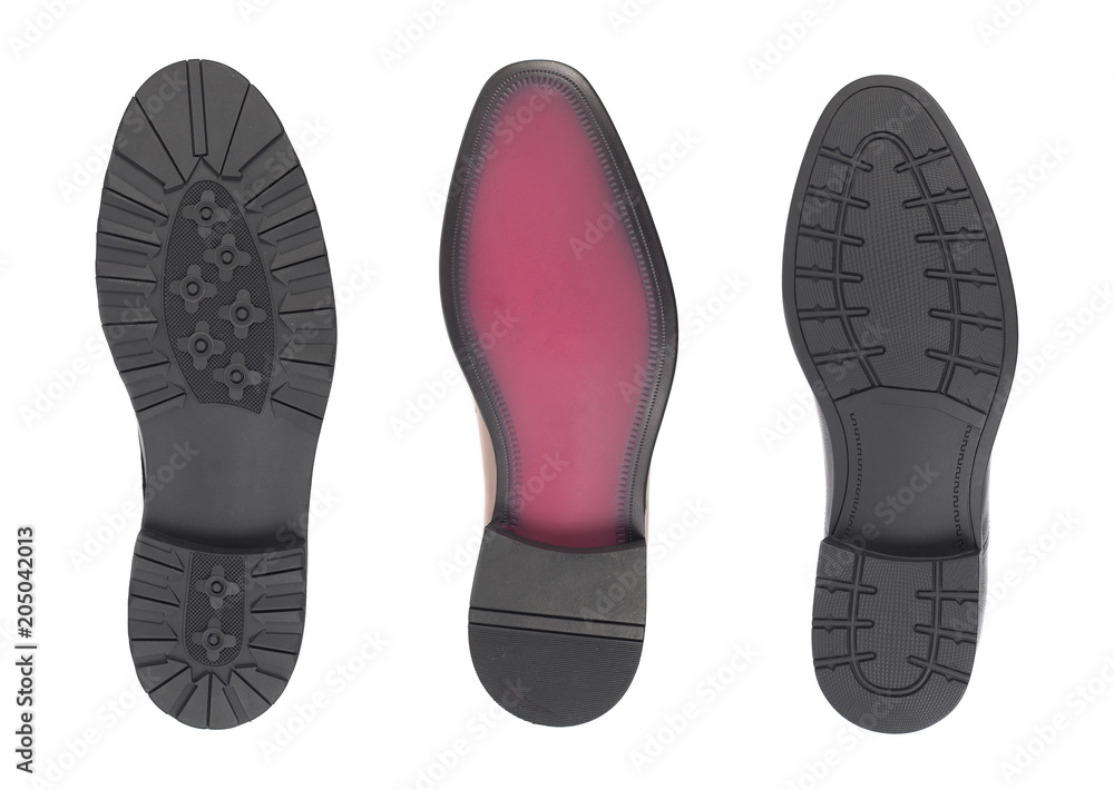 Black shoe sole. Isolated on a white background. Black shoe sole. Isolated on a white background.