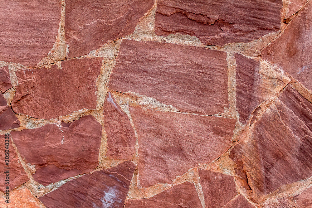 Fototapeta premium Wall of a flat natural stone