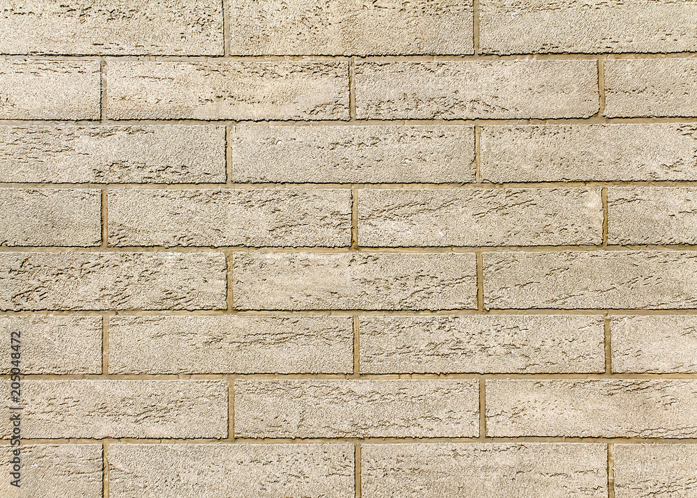 Fototapeta premium plastered brick wall as background