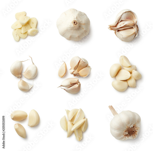 Set of fresh whole and sliced garlics photo