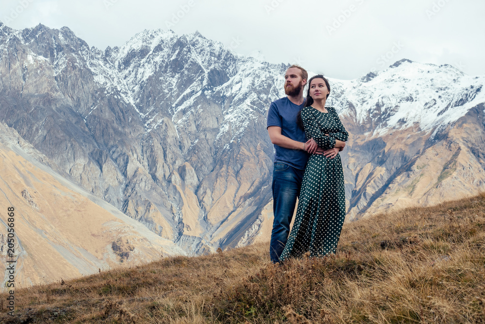 Fototapeta premium couple in love walking in the mountains romantic