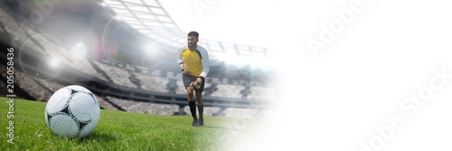 Soccer player on grass in stadium