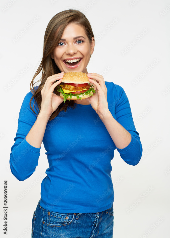 Smiling woman holding hamburger isolated portrait