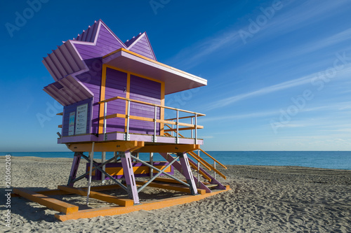 Scenic morning view of an iconic purple and orange lifeguard tower on South Beach, Miami © lazyllama