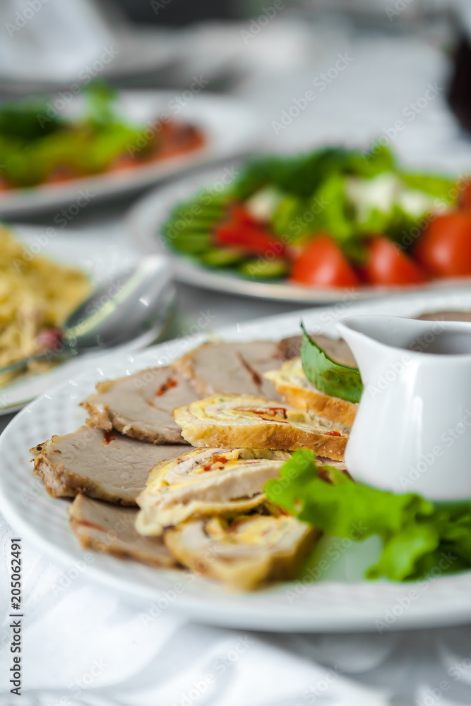 Cold cuts, meat cuts, rolls of cutlets, chops, serving, restaurant Cold cuts, meat cuts, rolls of cutlets, chops, serving, restaurant