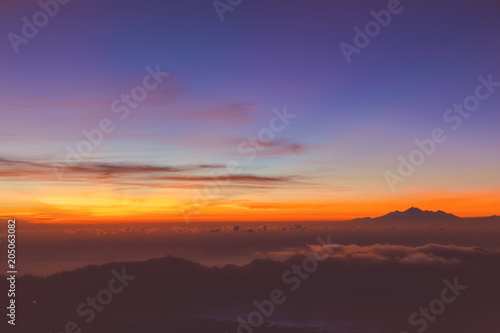 View of sunrise from the Mount Batur volcano, Bali, Indonesia. © astrosystem