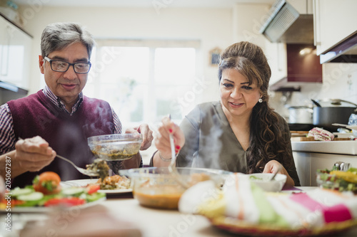 Photos Mature Couple Enjoying Dinner at Home