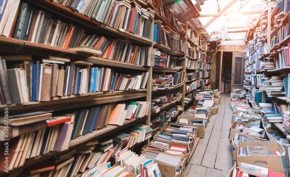Public library has been thrown. Shelves and books boxes. Atmospheric old library. Background. Public library has been thrown. Shelves and books boxes. Atmospheric old library. Background.