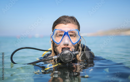Scusa diver ready to dive in the sea