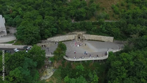 Wallpaper Mural Top to bottom: happy young couple standing on a hill on a summer day. Husband and wife newlyweds relax in a Sunny Park after the wedding. Young man and woman walking in the Park Torontodigital.ca
