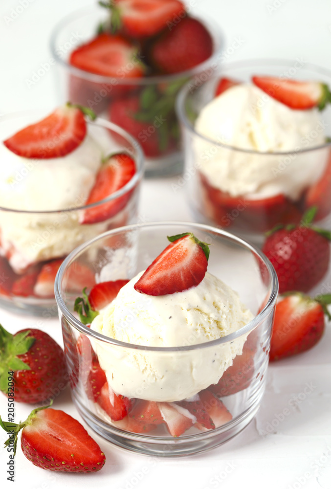 French vanilla ice cream with fresh strawberries French vanilla ice cream with fresh strawberries