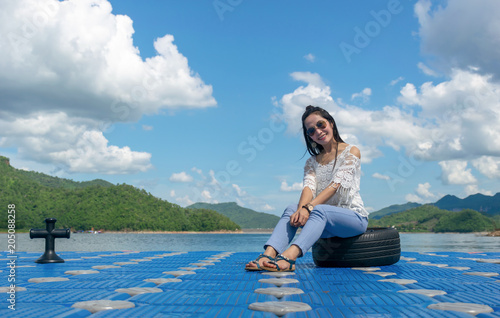 Photography Women travel sit at harbor and sky