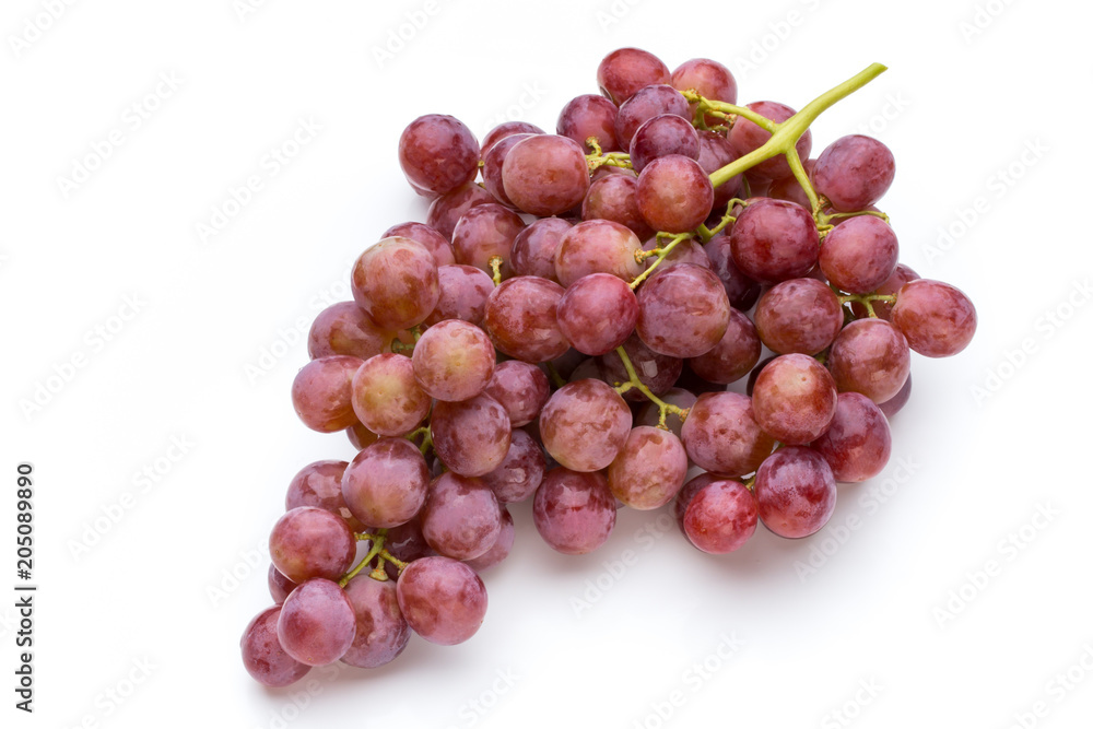 Ripe red grape isolated on white. Ripe red grape isolated on white.