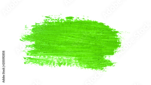 green stroke of the paint brush isolated on white