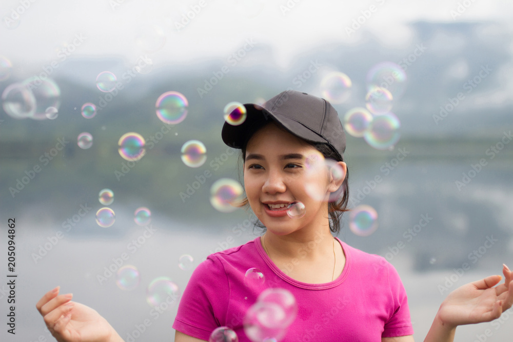 Thai girl enjoy her lifestlye and happy with air bubbles Thai girl enjoy her lifestlye and happy with air bubbles