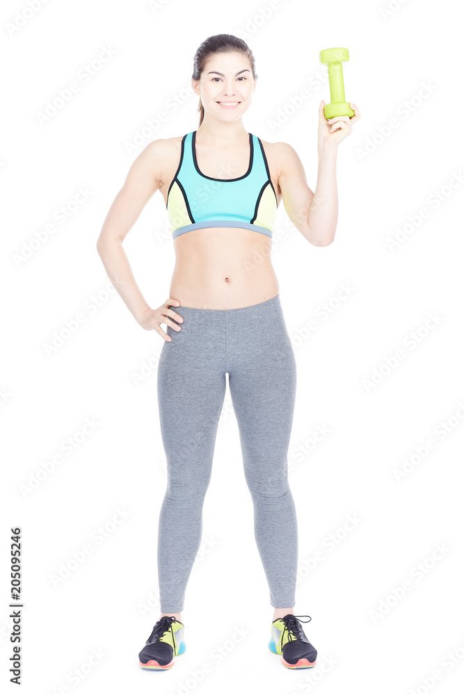 Portrait of attractive female gym goer exercising with dumbbells on white background
