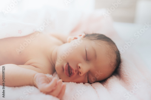 newborn sleeping baby , close-up, lifestyle, the concept of purity and innocence.