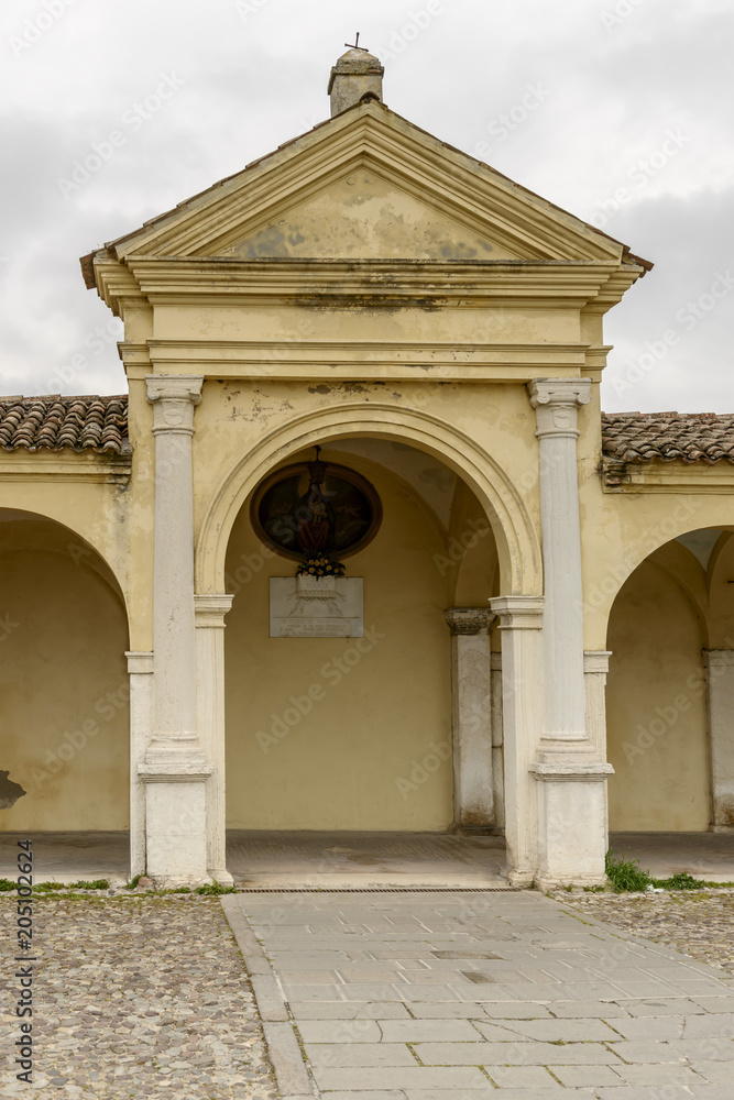 shrine at santa Maria covered walkway on Mazzini street, Comacchio, Italy