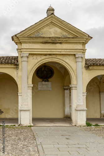 shrine at santa Maria covered walkway on Mazzini street, Comacchio, Italy © hal_pand_108