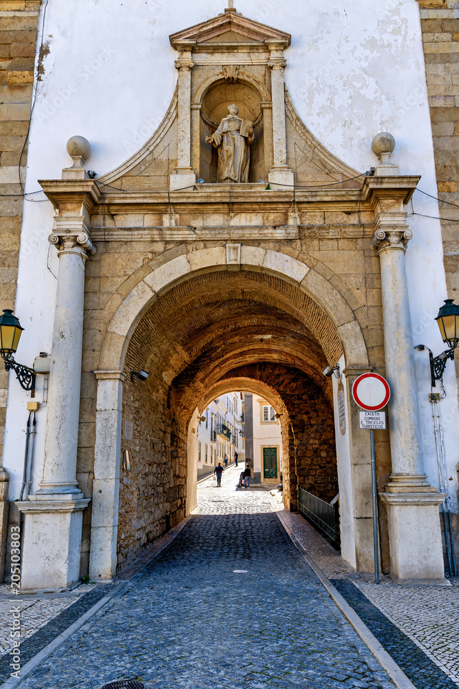 Closeup view of the Arch of Faro, main entrance to old town Faro, Portugal