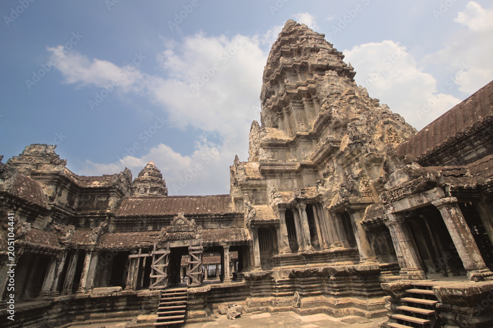 Detail of the ancient Angkor Wat Temple in the Angkor Area, near Siem Reap, Cambodia, Asia. Buddhist monastery from the 12th century. Asian architectural background.