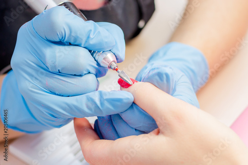 Manicure process, cleaning of nails by a milling cutter