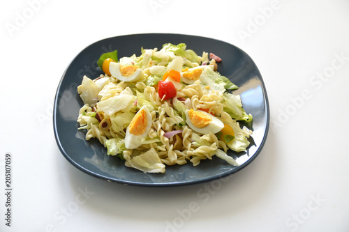 A salad with an assortment of pasta, vegetables and raw vegetables, for a diet, or for light meals. Eat healthy.