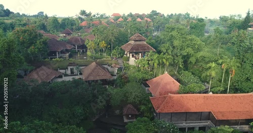 Aerial view of tropical village, city. Flight over Bali - October 2017: Sukawati, Bali, Indonesia photo