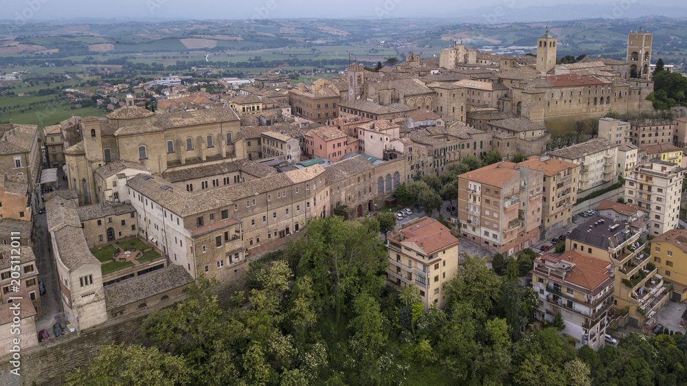 Aerial view of the municipality of Osimo, in the province of Ancona, in the Marche region, in Italy. The historic center with its walls, roofs, squares is a mountain tourist destination.