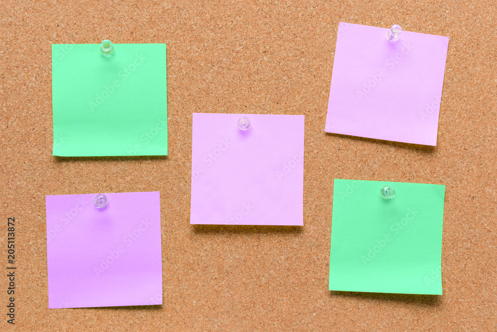 empty square green and purple pinned sheet on a brown cork reminder empty square green and purple pinned sheet on a brown cork reminder