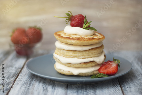 Dessert Pancakes with Cream and Strawbery. Health Breakfast Fruit Berry Vitamine Gray Rustic Wooden Background