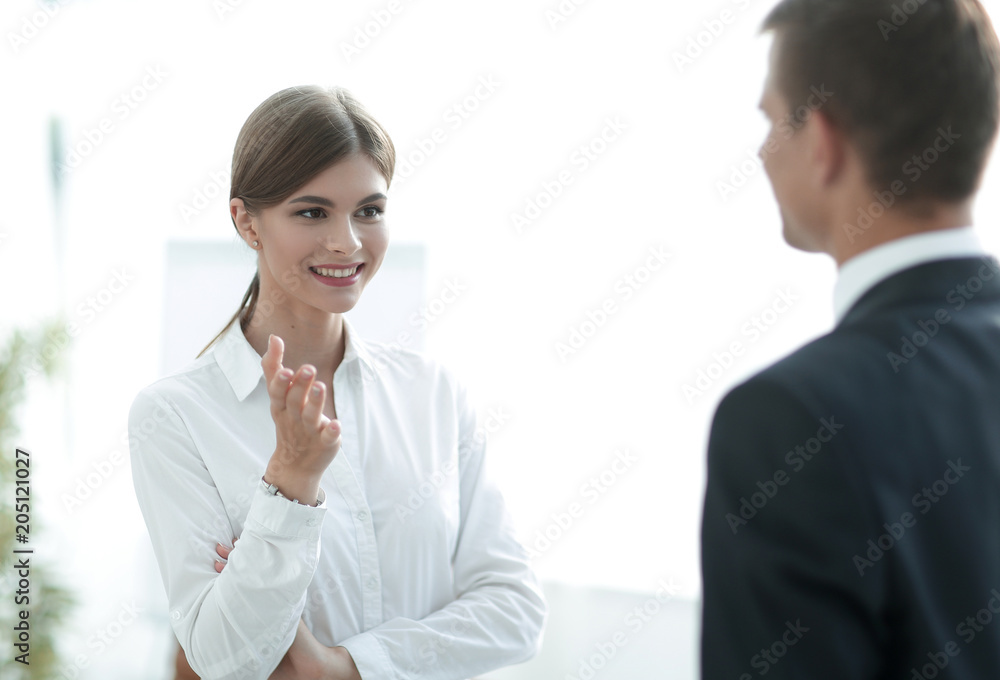 business woman talking with a colleague..