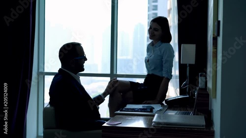 Young business couple are having office affair in the office, 4K
