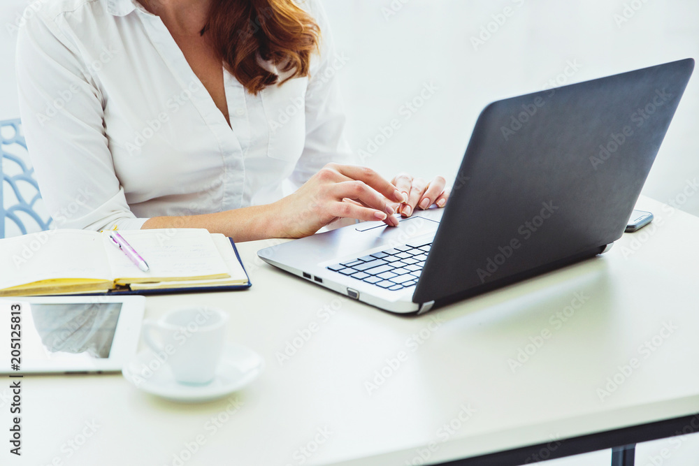Workplace with tablet pc, laptop, notebook and cup of coffee Workplace with tablet pc, laptop, notebook and cup of coffee