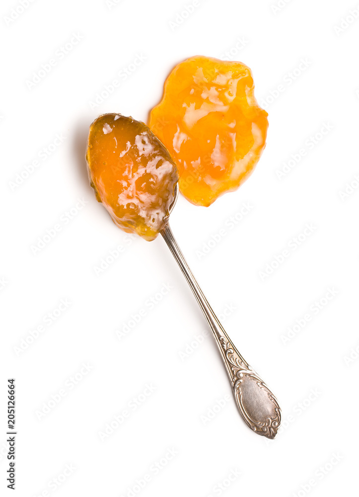 Tasty apricot jam in spoon. Tasty apricot jam in spoon.