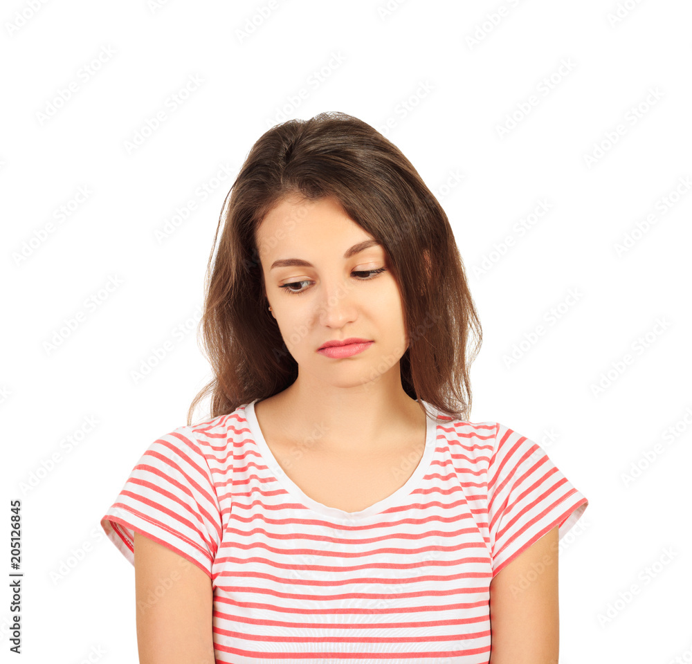 A young sad woman, isolated on white background. emotional girl isolated on white background A young sad woman, isolated on white background. emotional girl isolated on white background
