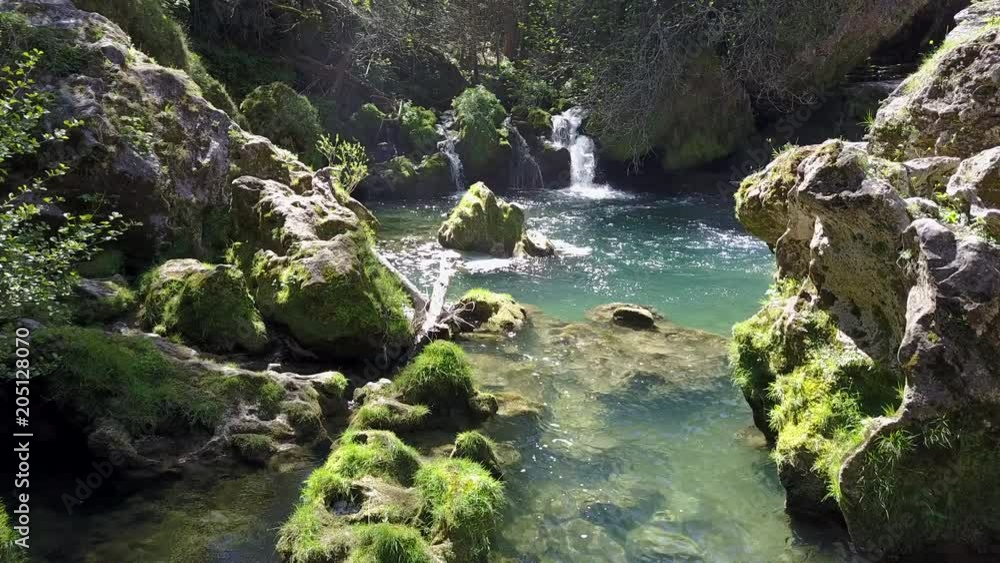 Aerial, scenic river waterfall in France Aerial, scenic river waterfall in France