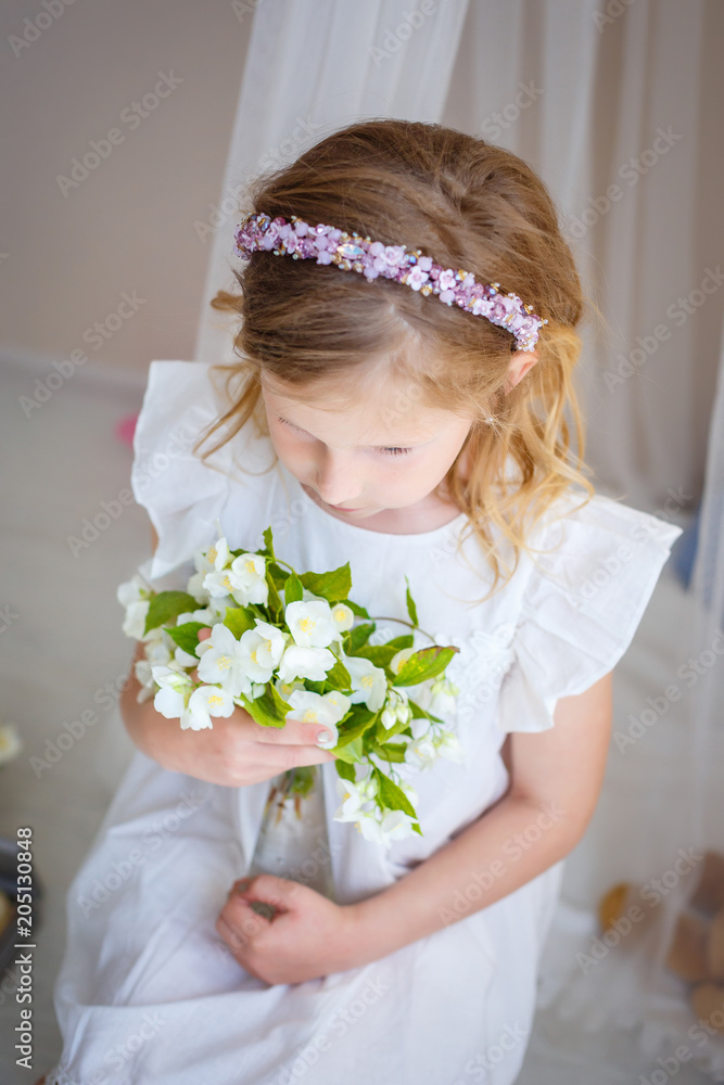 Cute little girl dreams of becoming a princess Cute little girl dreams of becoming a princess