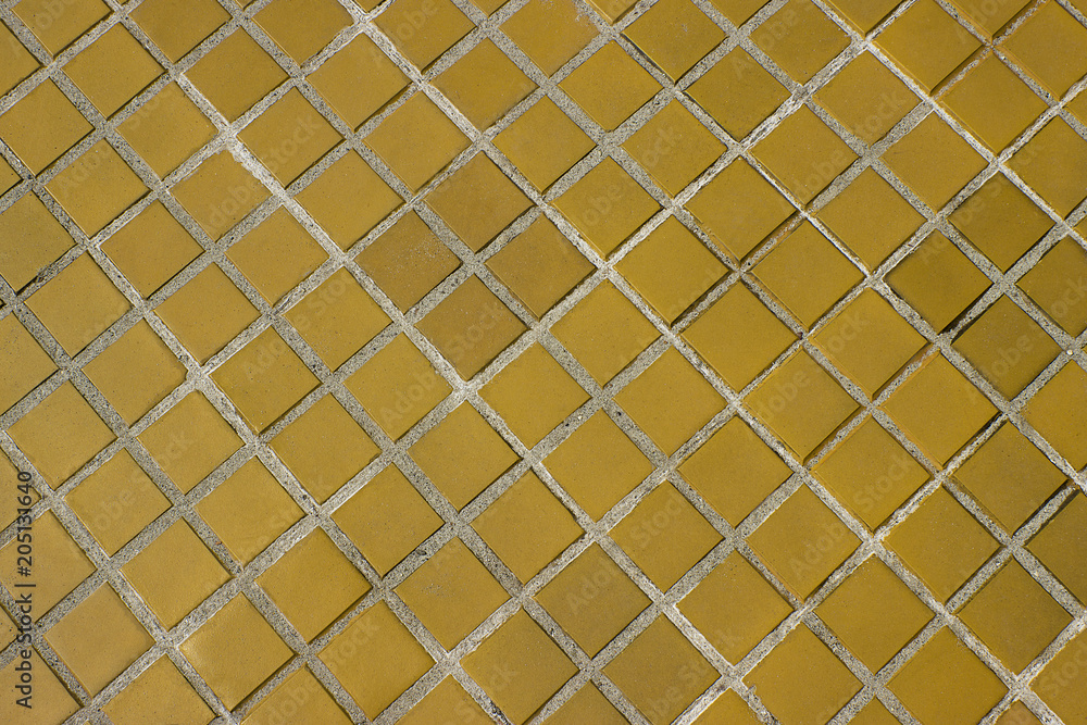 Fototapeta premium Yellow square tile floor background or texture.