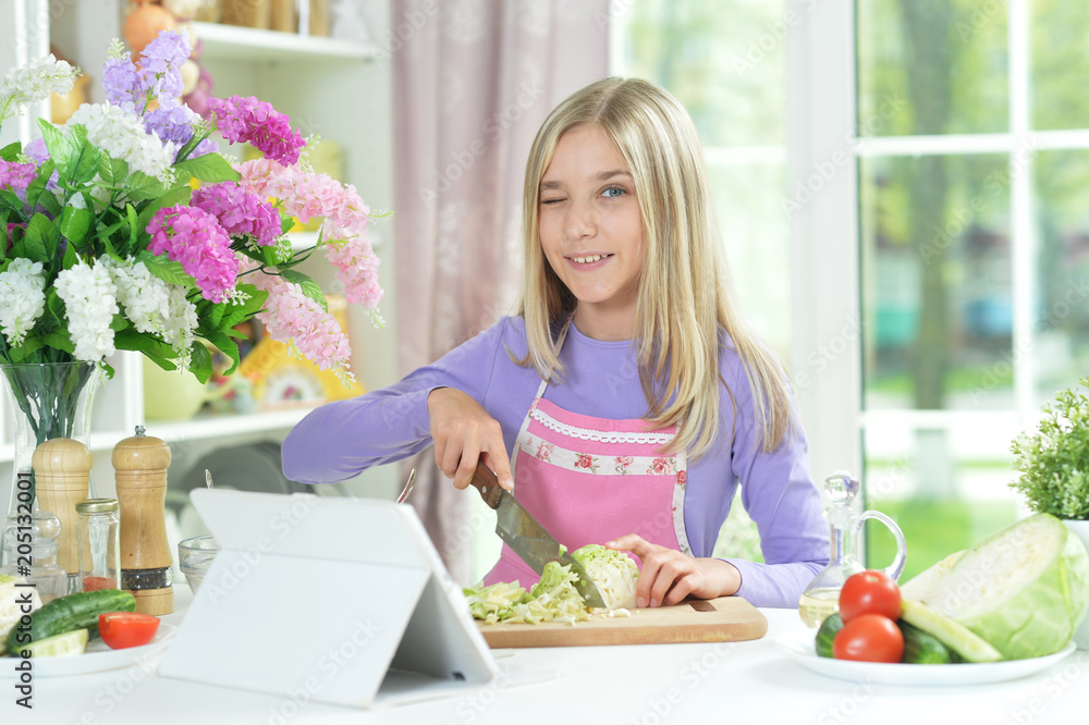 Cute girl preparing fresh salad Cute girl preparing fresh salad