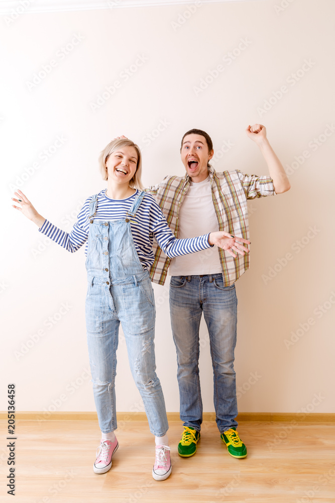 Fototapeta premium Image of man and woman in new empty apartment