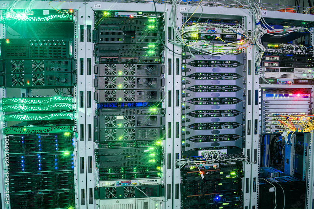 Many equipment is installed in the server room of the data center. The  central technical site of the Internet provider. The main router is in the  rack. Stock Photo | Adobe Stock