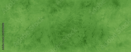 Old green background with distressed vintage marbled texture in Christmas green color.