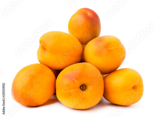 A bunch of ripe apricots on a white, isolated.