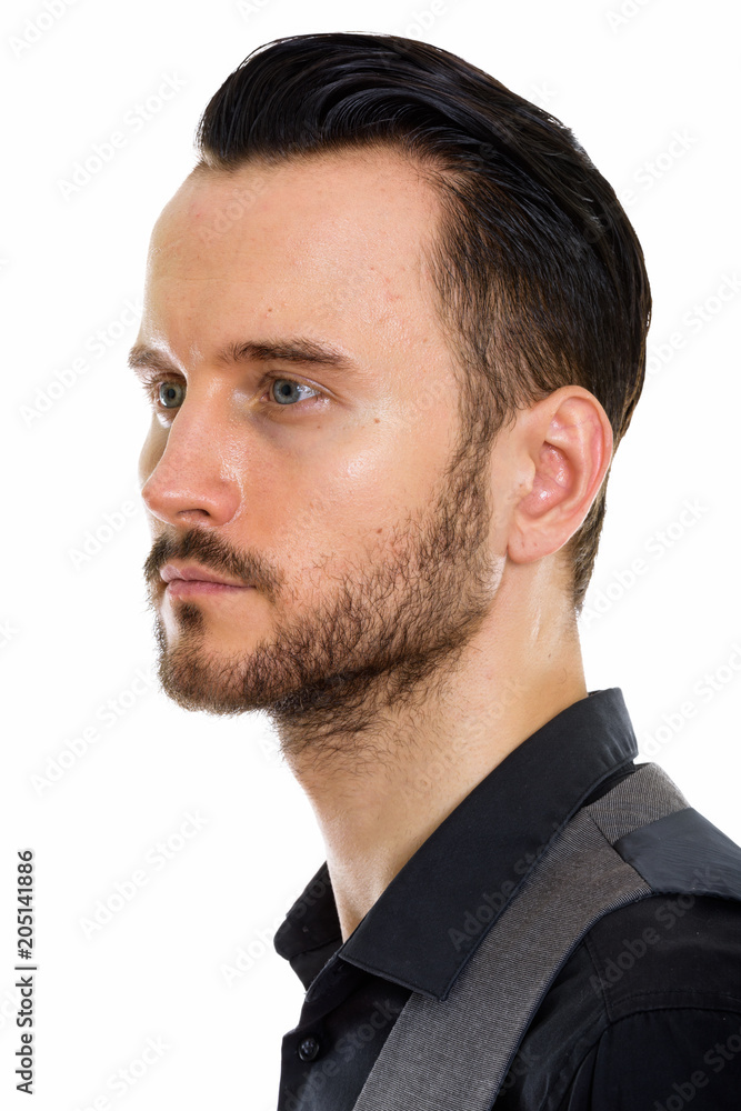 Obraz premium Young handsome bearded businessman