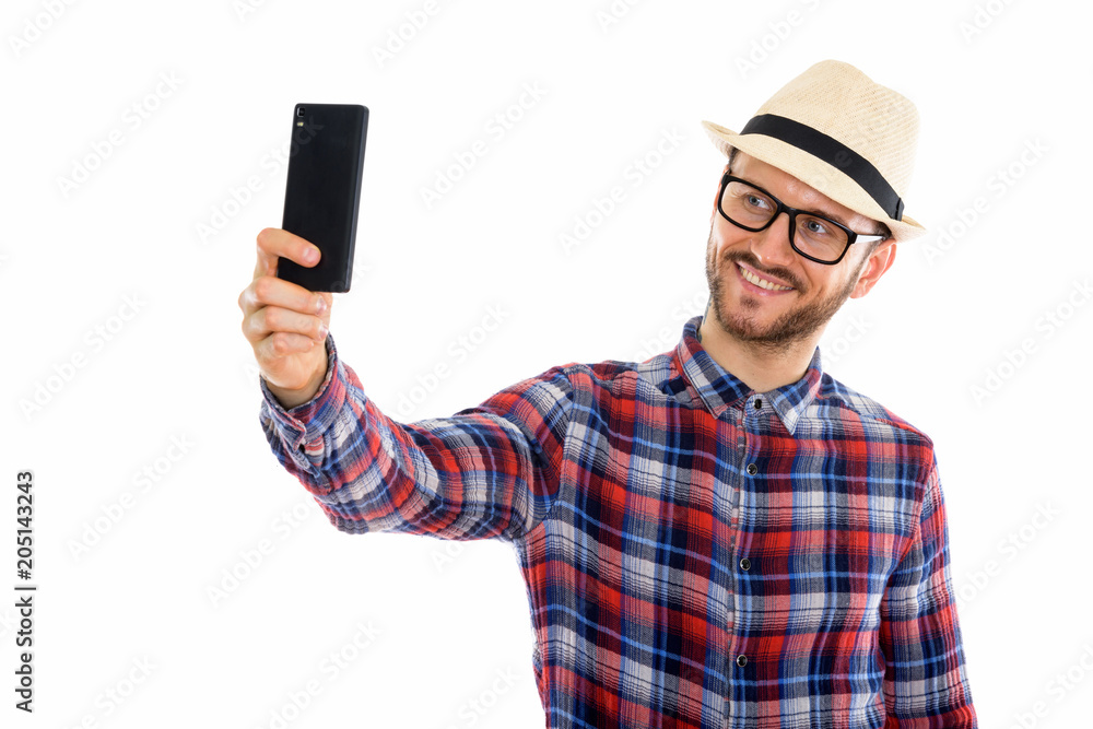 Young handsome bearded tourist man ready for vacation Young handsome bearded tourist man ready for vacation